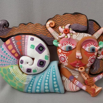 Cheerful ceramic sculptures with golden hands of a master — 2